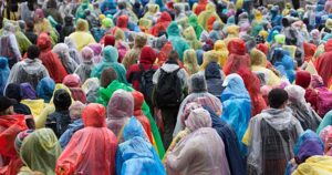 event crowd in colorful raincoats