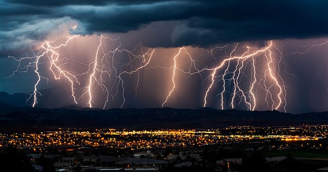 lightning over cityscape