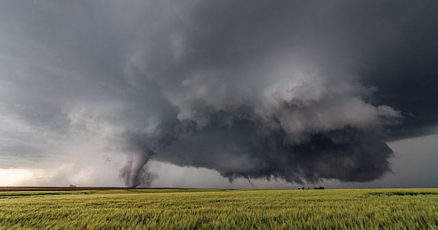 tornado on horizon over plains