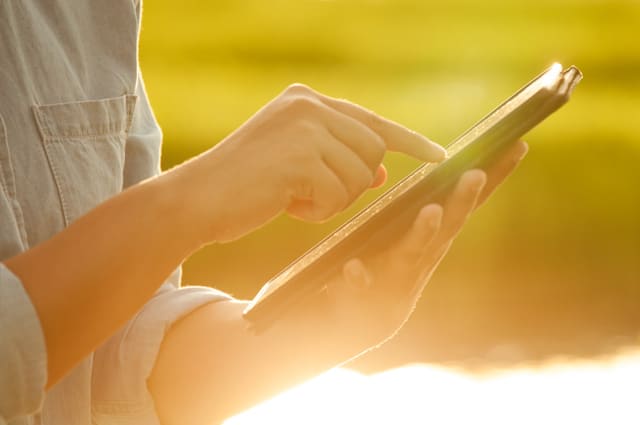 Farmer on Tablet