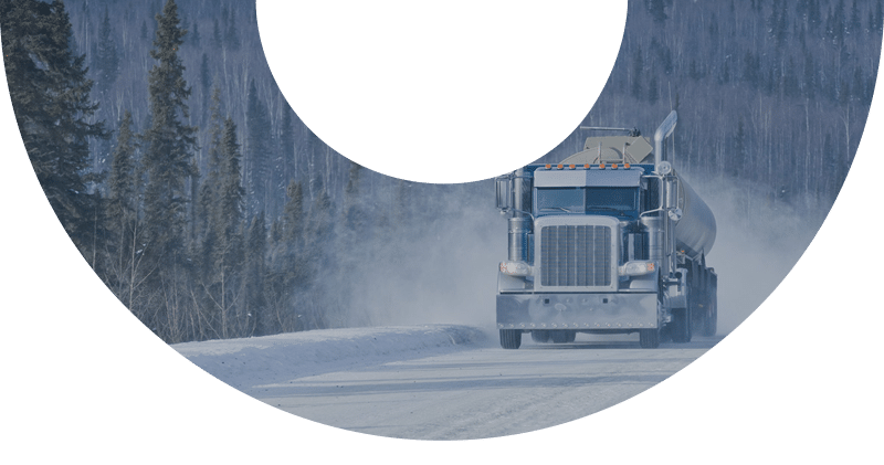 Truck driving in snowy conditions