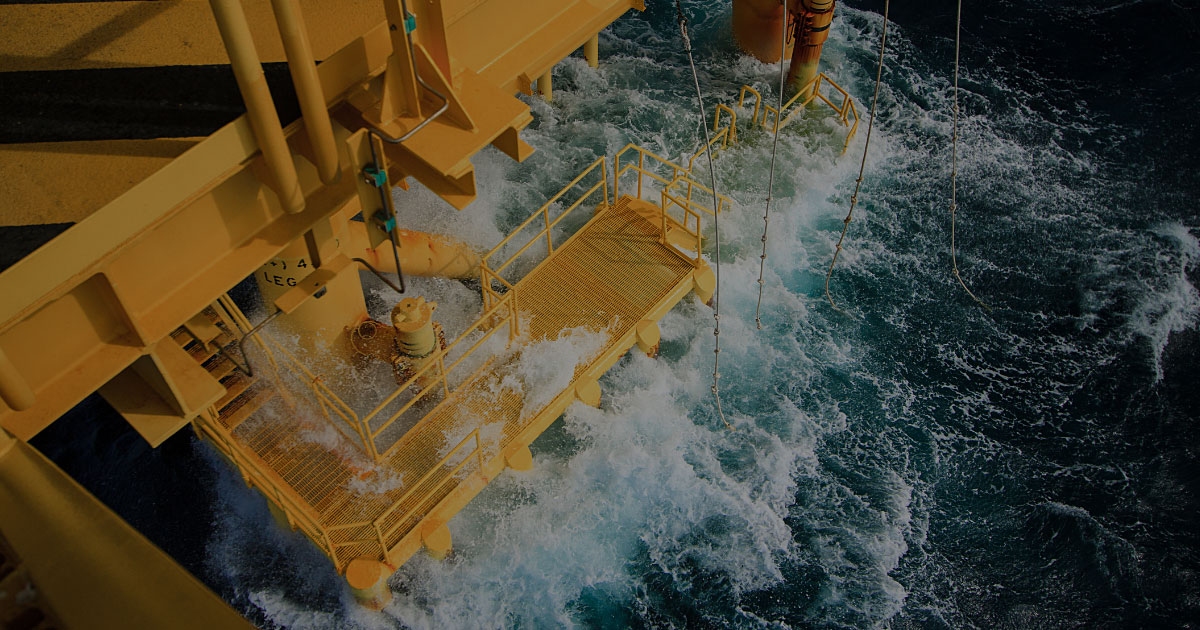 metocean services yellow oil platform walkway partially submerged