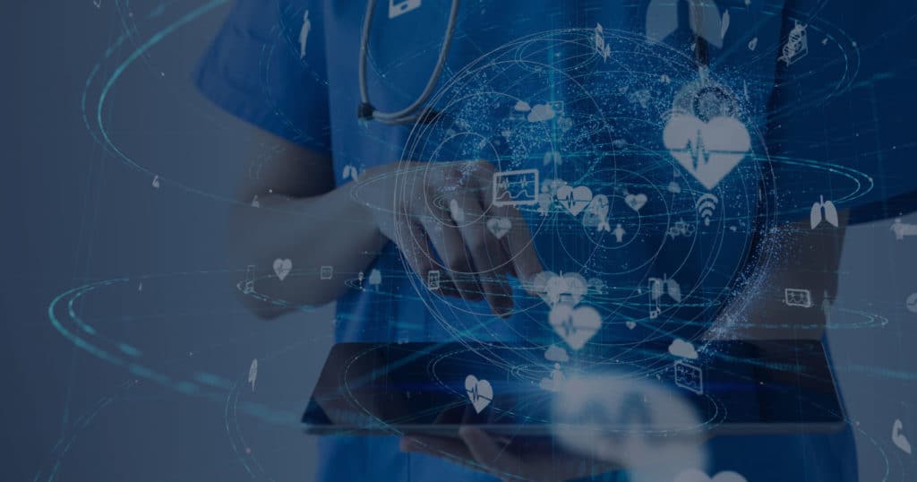 nurse in blue scrubs pointing on tablet device with digital icons floating