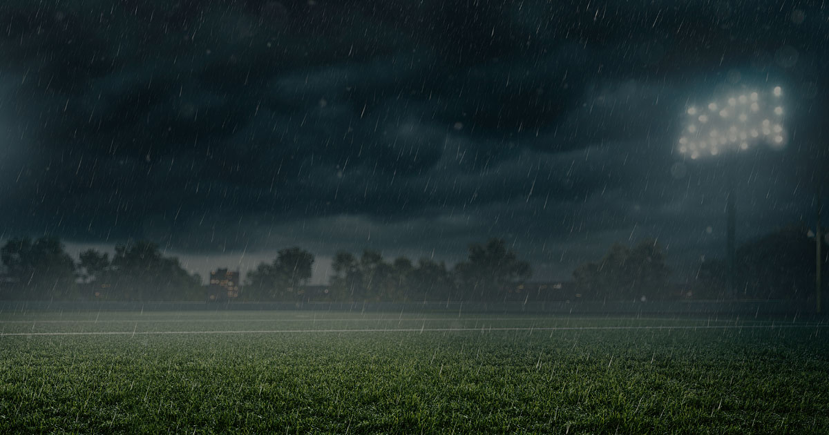 rainy field with floodlights onguard benefits bg