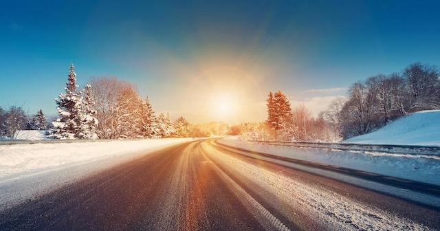 Rising sun on a winter road