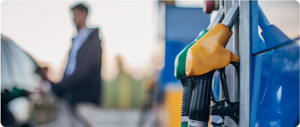Man pumping gas