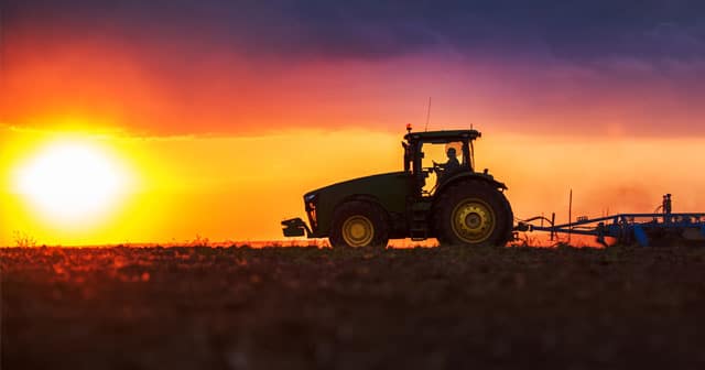 News Insights tractor planting on a spring morning