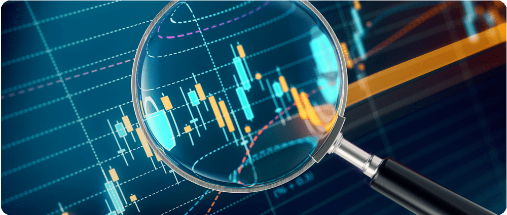 Magnifying glass over candlestick chart
