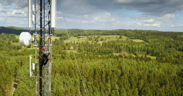 Blog Header telecom worker high up