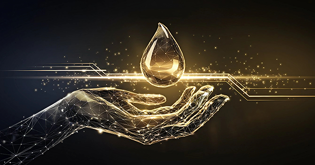 High-tech digital hand holding an oil drop