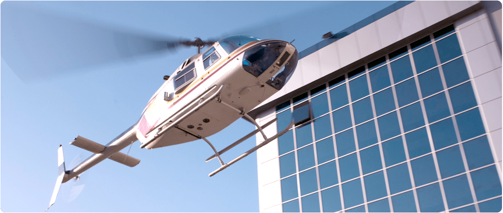 Helicopter flying in the city