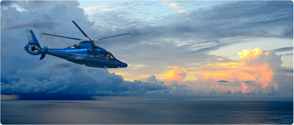 Helicopter flying over water