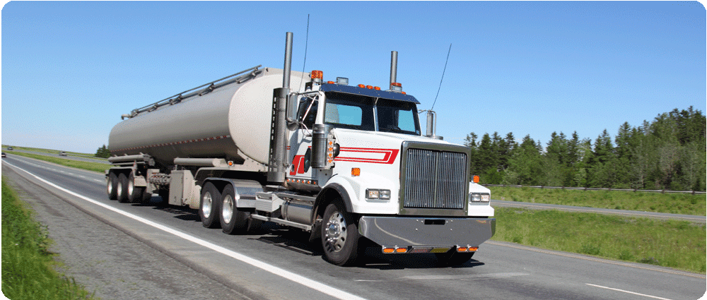 Fuel truck driving down highway