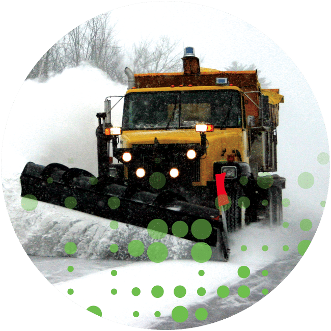 Snowplow driving through snow