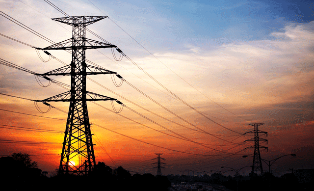 Electrical pylons in sunrise