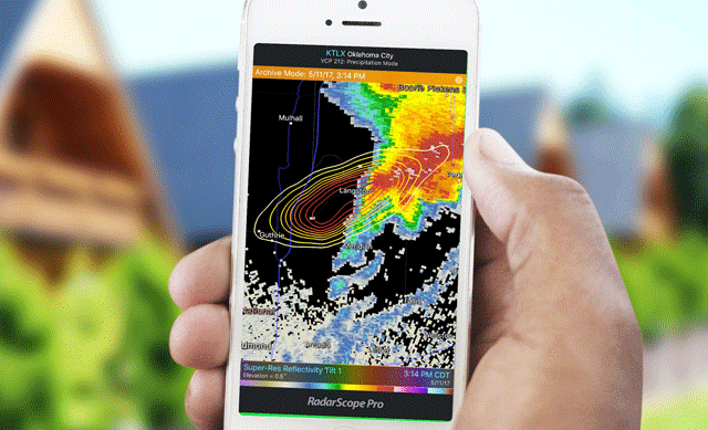 Hand holding phone with Radarscope app
