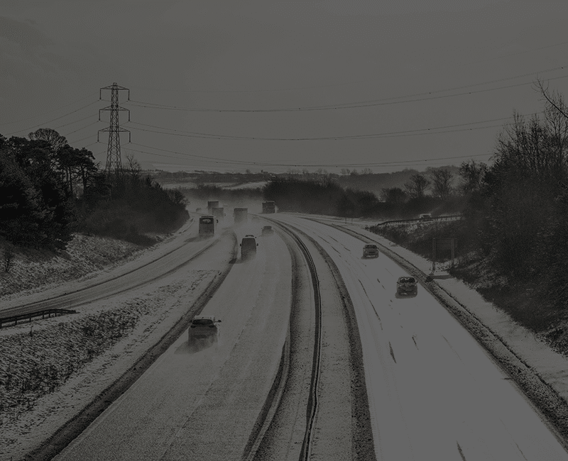 Resource Cars on Snowy Highway