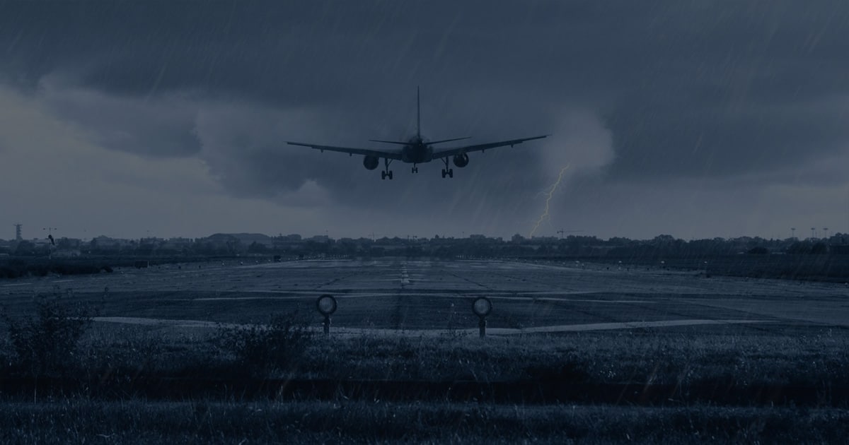 Features Airplane landing in rainstorm