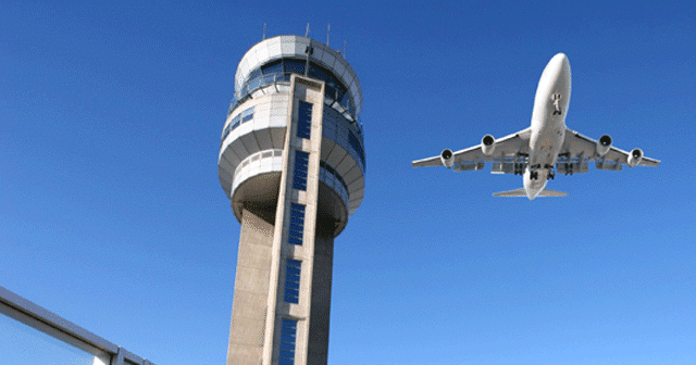 News insights Airplane flying over control tower