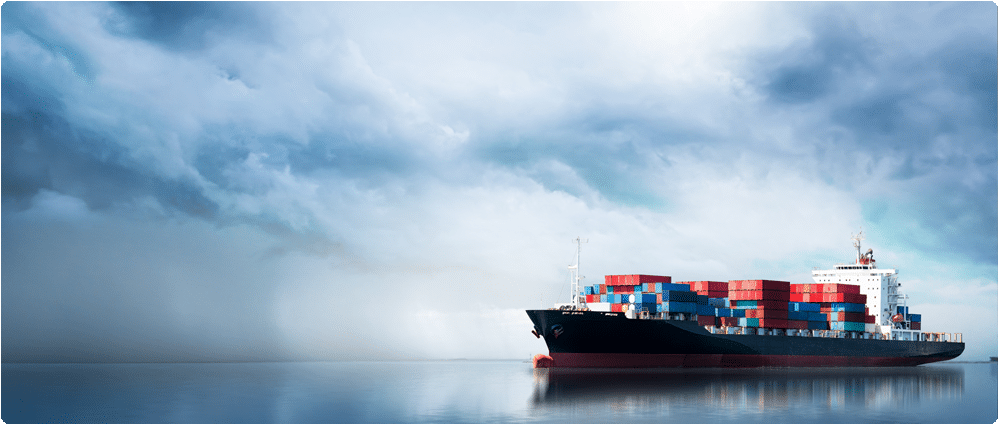 Container ship with dark clouds