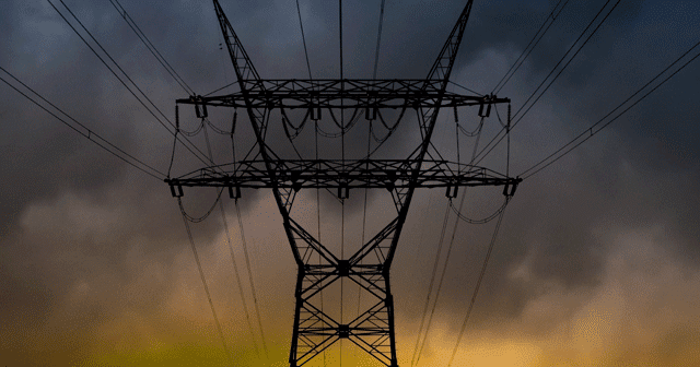 Blog header Electrical pylon with dark clouds