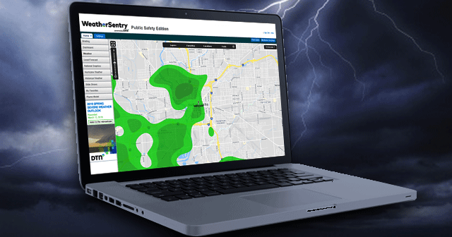 Blog header WeatherSentry on laptop with lightning background