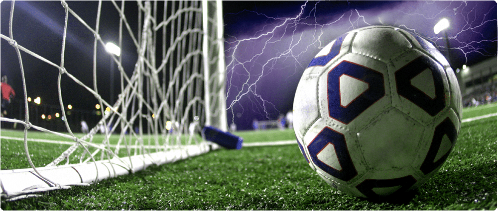 Soccer ball with lightning in background