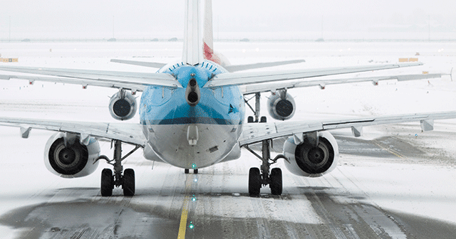 Blog header airplane on snowy ground