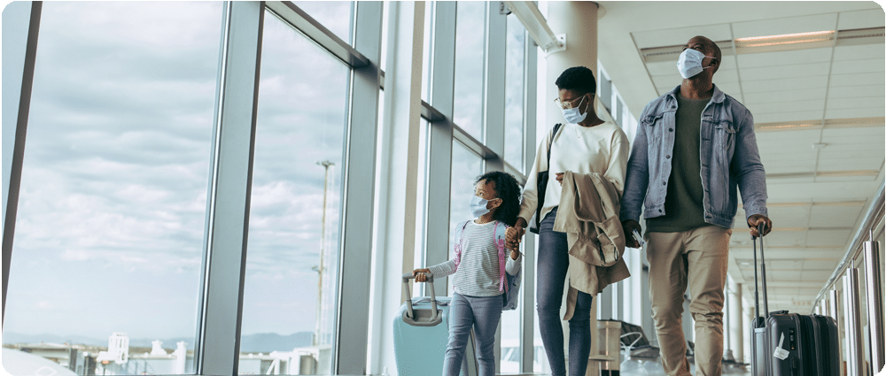 Family walking in the airport