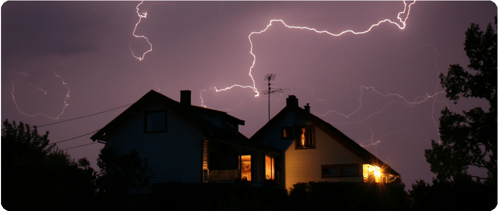 House with lightning in the sky