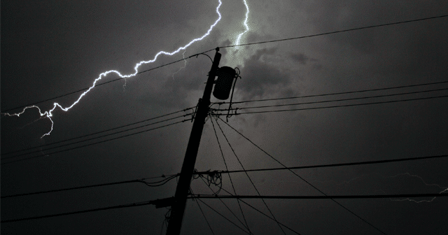 Blog header Lightning strike by power line silhouette