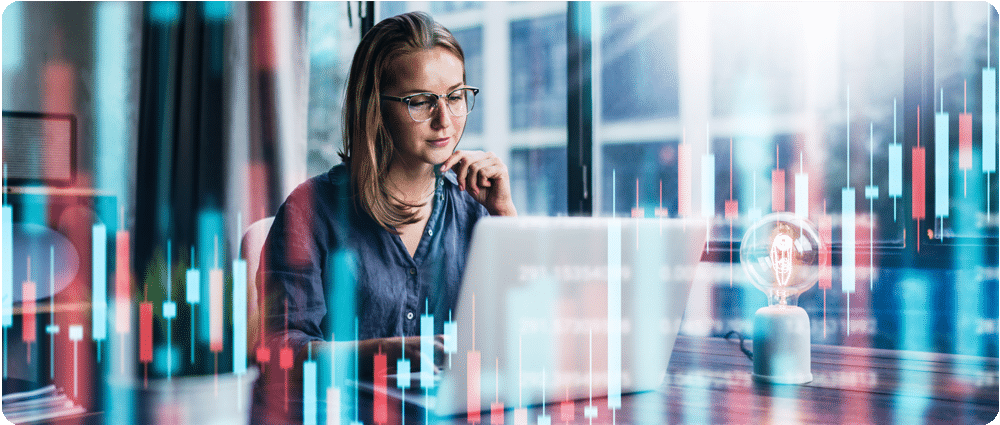 woman on laptop with data superimposed