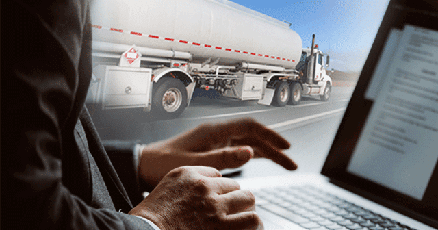 Blog header Hands on laptop with fuel truck