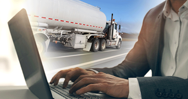 Blog header hands on laptop with fuel truck