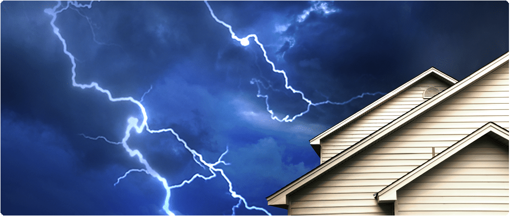 House with lightning strike in background