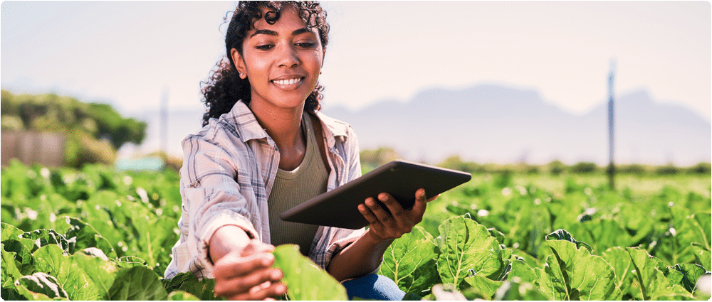 Young female farmer with tablet