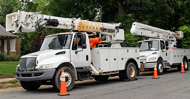 Blog header Two Utility Trucks