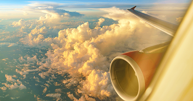 Blog header Airplane engine in the clouds
