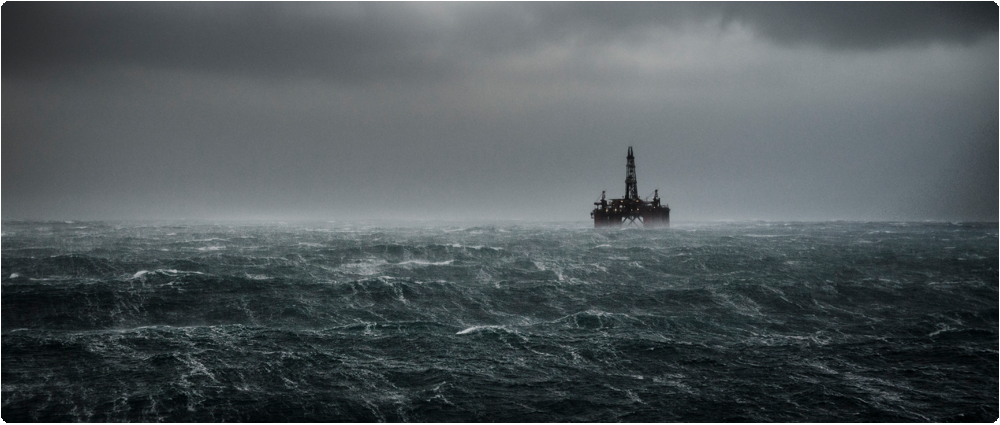 Offshore oil rig in ominous weather