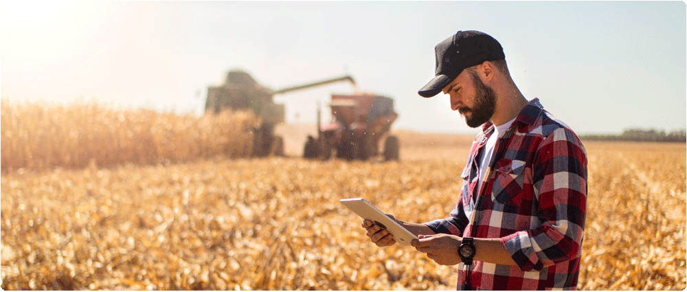 Farmer with tablet in the field