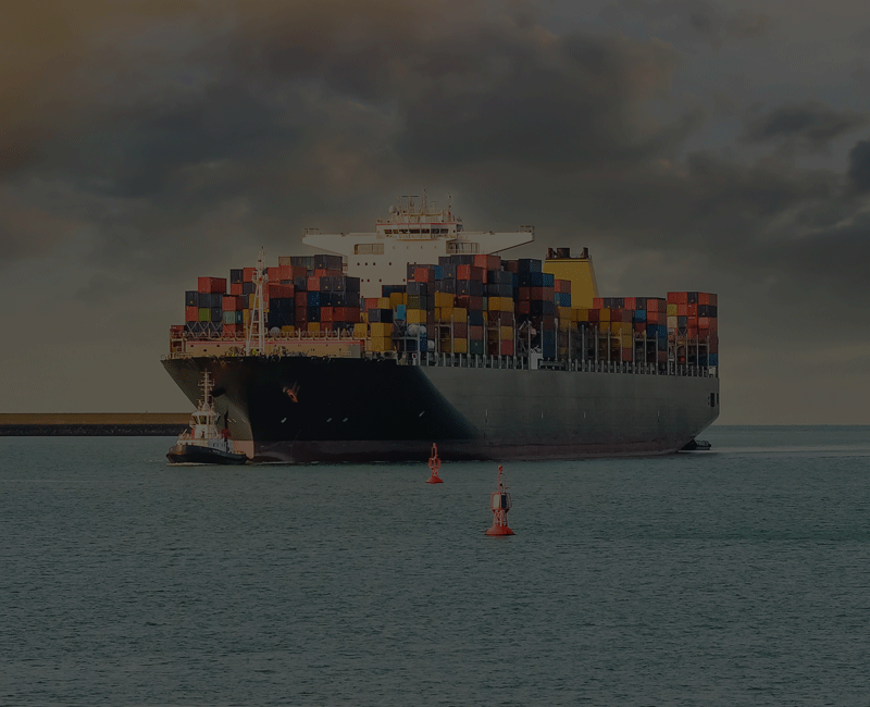 Resource Cargo ship with tugboat