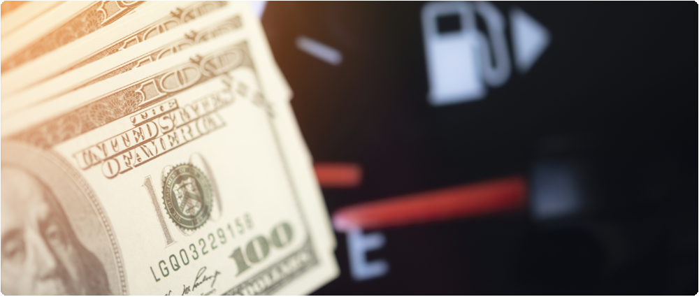 Money in front of fuel gauge