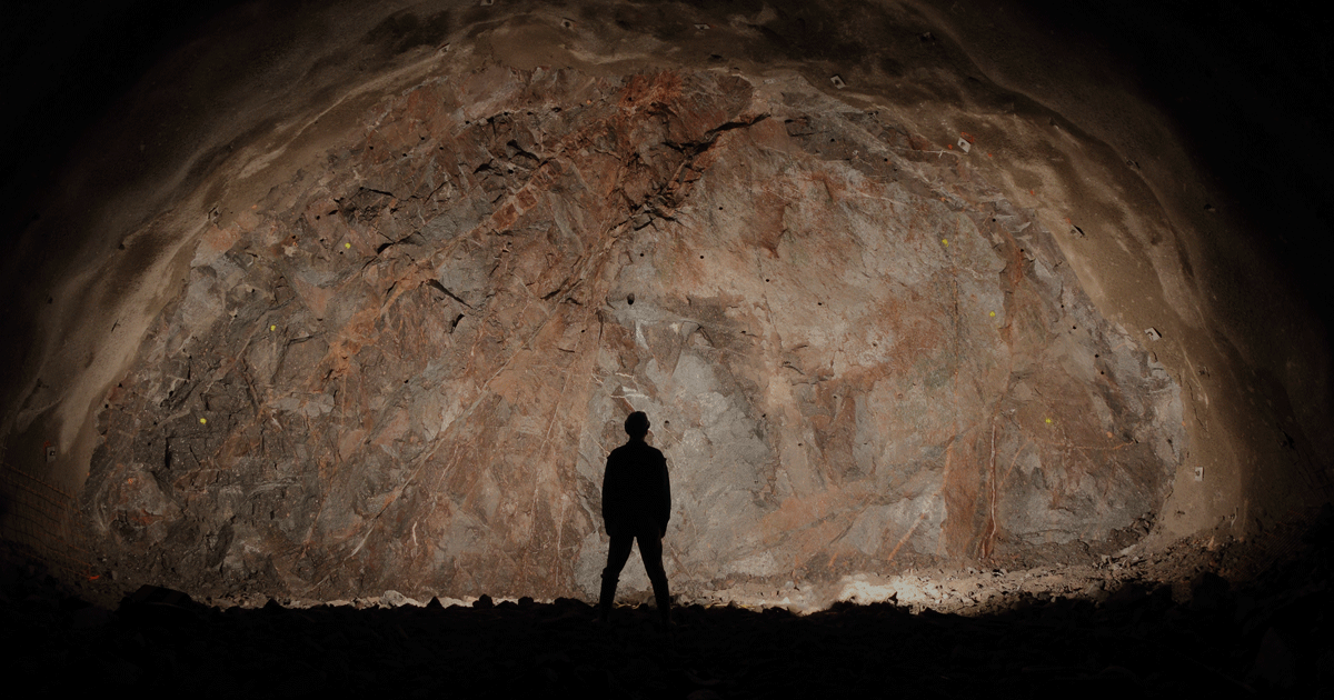 Miner in Cavern Features Benefits