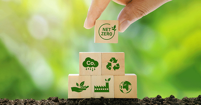 Hand stacking tiny eco-friendly blocks