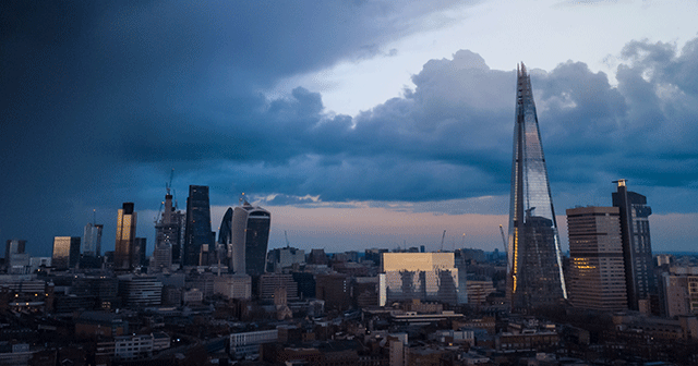 Aerial view of London with storm clouds