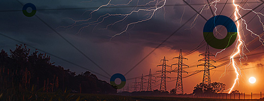 lightning and dtn logo at sunset with power poles in distance